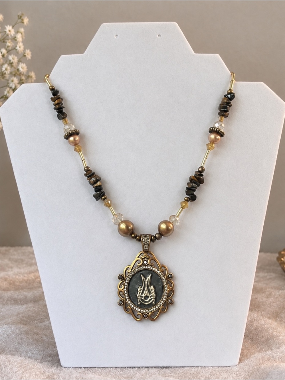 Elegant Gold-Tone Pendant Necklace with Brown Beads